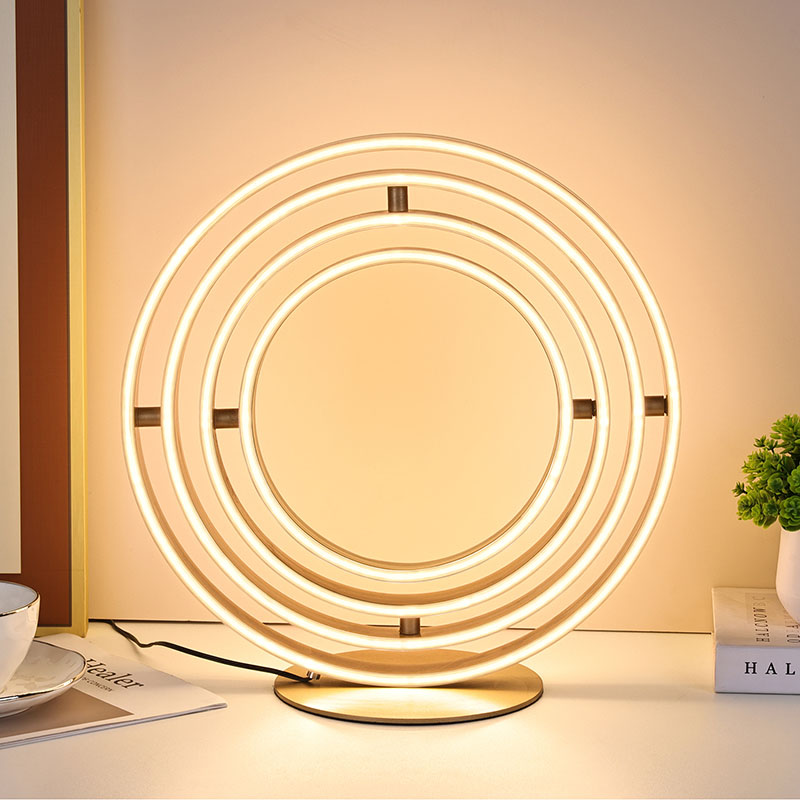 O candeeiro de mesa decorativo LED multi-anel